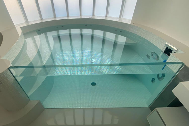 Spectacular hot tubs bathroom tiled in mosaic