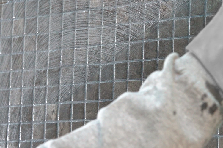 Cleaning cement-based grout residue from Ezarri mosaics