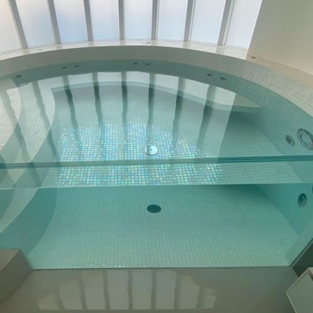 Spectacular hot tubs bathroom tiled in mosaic