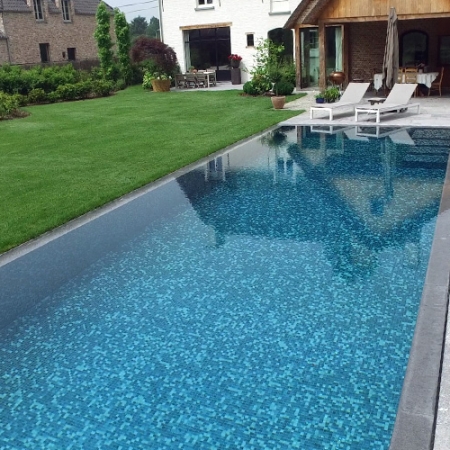 A grey mosaic tile mix for a swimming pool in northern Belgium